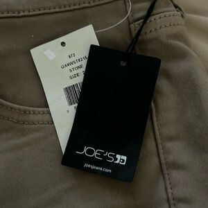 Brand new Joe jeans unisex tags still on 
Item needs a iron to knock wrinkles